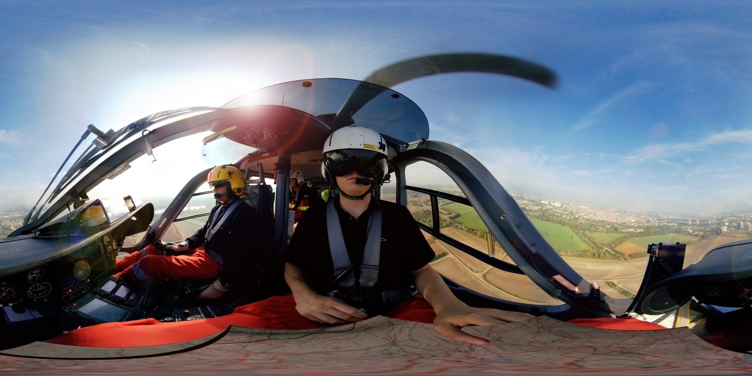 Helicopter pilots in the cockpit during the flight