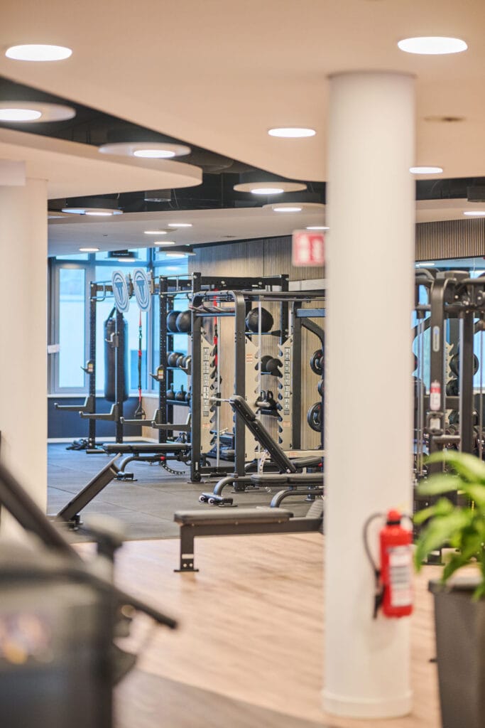 Modern fitness studio with training equipment