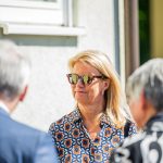 Person talking outside with sunglasses