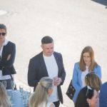 Outdoor group meeting with drinks.