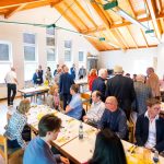 People at a meeting in a bright room