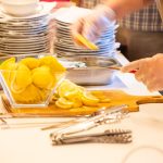 Cutting lemons on a kitchen table